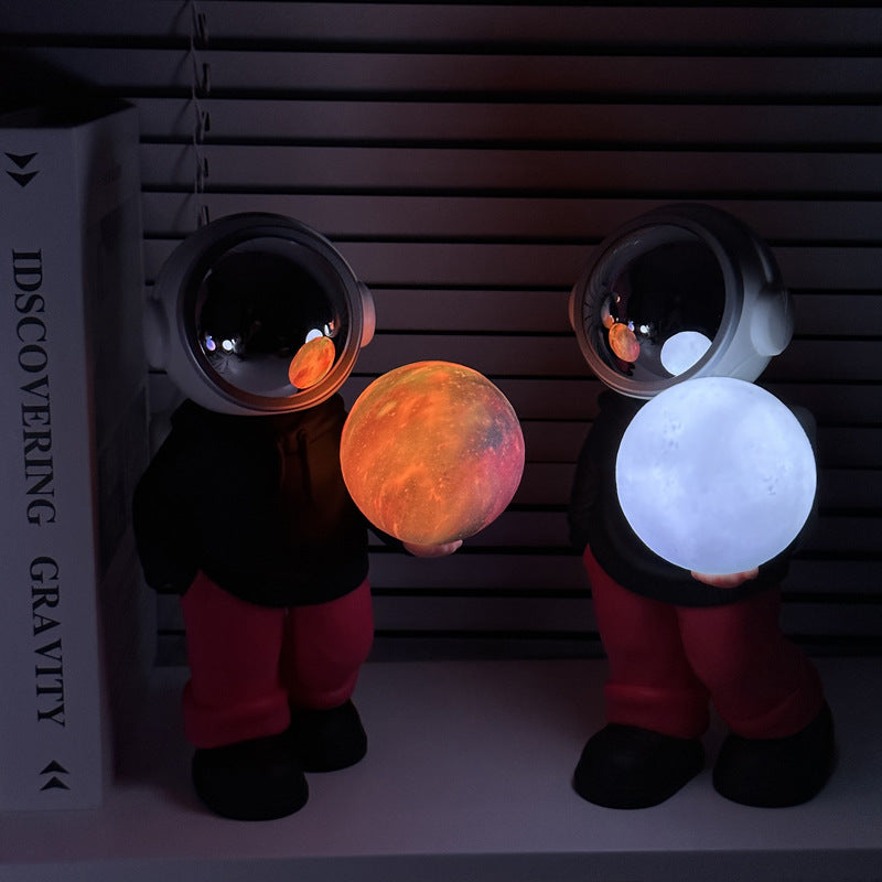 Creative Astronaut Bluetooth Speaker with 3D Starry Sky Lighting (beige top + brown pants)