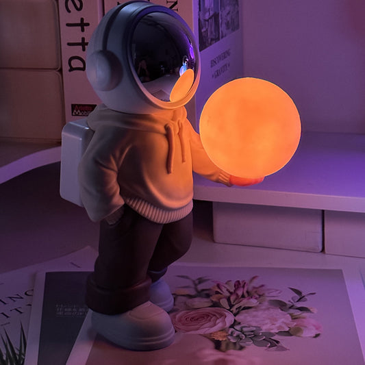 Creative Astronaut Bluetooth Speaker with 3D Starry Sky Lighting (beige top + brown pants)